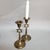 A handsome pair of vintage brass Judaica candlesticks featuring openwork Star of David motifs incorporated into the stems....