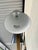 Modern Currey & Co Duet Floor Lamp. Bronze / Brass finish. Tapered body, with tapered metal shades. Original retail $1970....