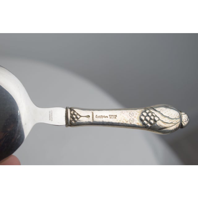 A six-piece antique silver service, designed and produced by Copenhagen silversmith Evald Nielsen, a contemporary of Georg...