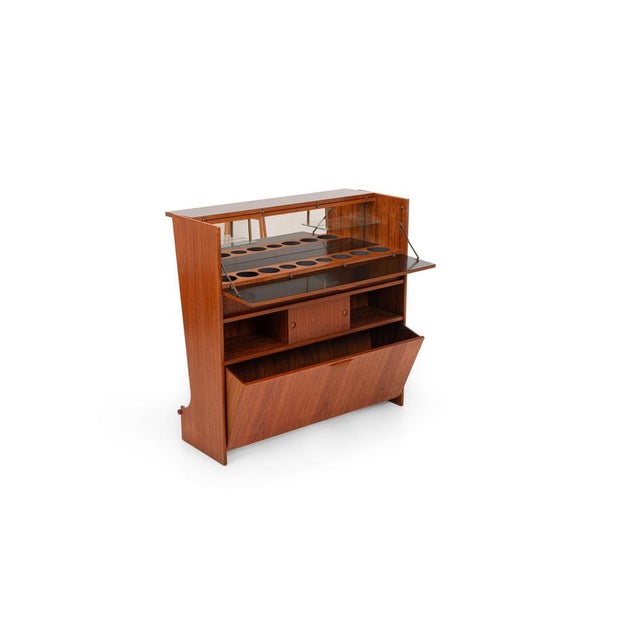 Danish cocktail cabinet, model “sk661”, designed by johannes andersen for skaaning & son, denmark, 1960s. This exceptional...