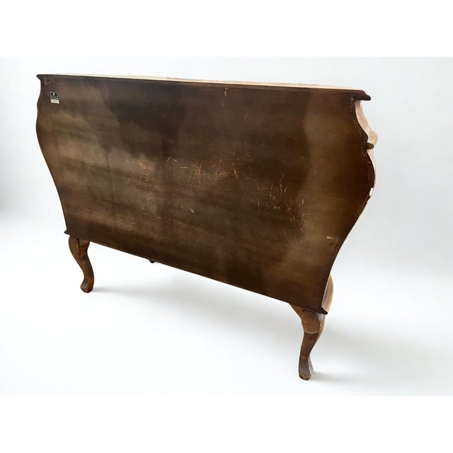 Vintage Bombay‑Style Burl Walnut Chest by Decorative Crafts A beautifully crafted accent chest showcasing the warm...