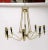 Offered is an Italian chandelier in a gorgeous metallic brass finish with black accents. This beauty features eight socket...