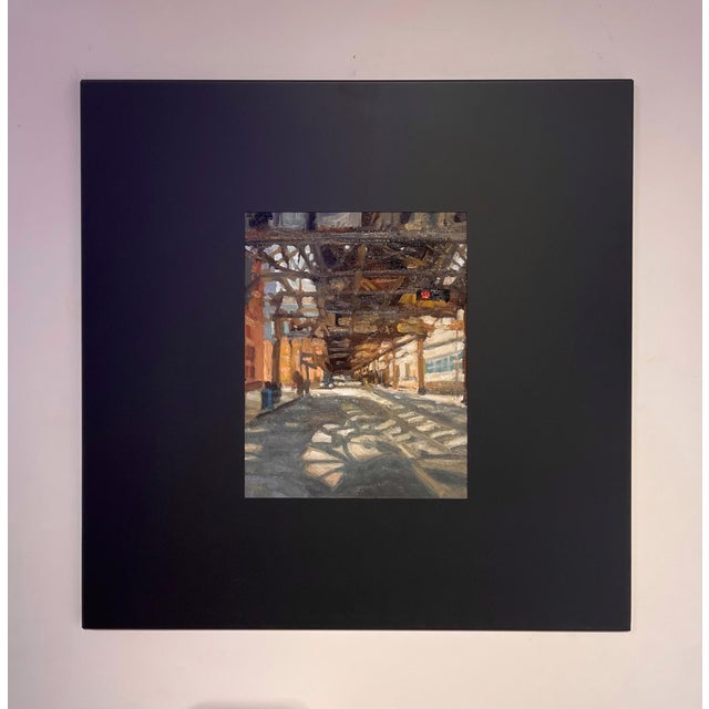 Beneath the El 1 captures the interplay of light and shadow beneath an elevated train structure. The scene evokes a sense...