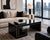 A striking modern coffee table by Currey & Company, featuring a sculptural architectural silhouette finished in rich black...