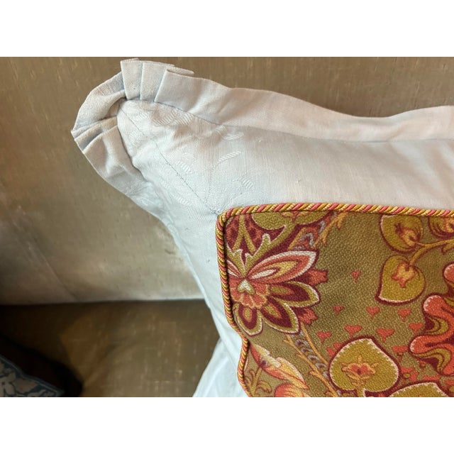 A pillow made from a 19th C. French Arts & Crafts era printed cotton, backed and edged with hand dyed linen damask, a down...