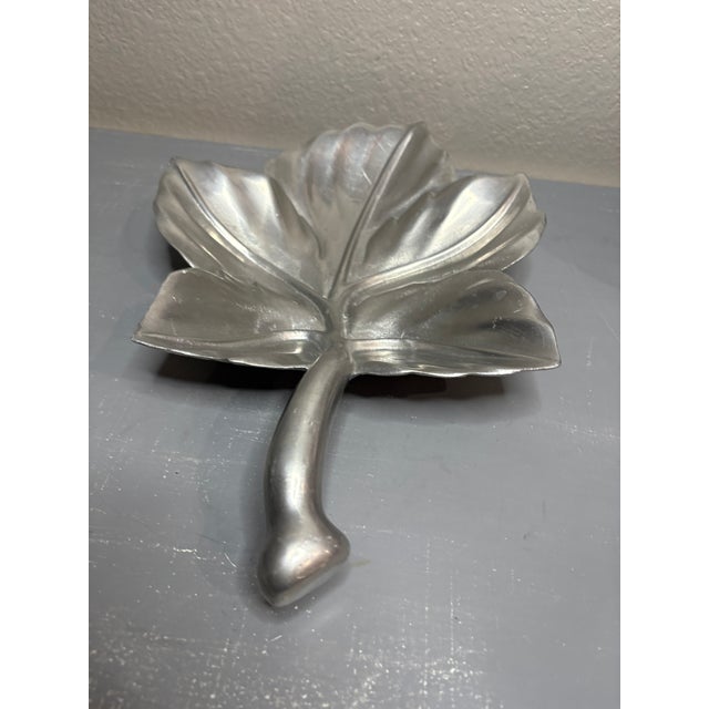 Sculptural vintage cast aluminum leaf bowl, attributed to the work of Bruce Fox. This mid-century piece features a...