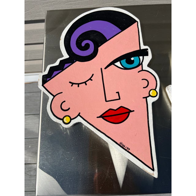 Purple Head 14.5H 9.5W Blue Head 17.25H 9.5W