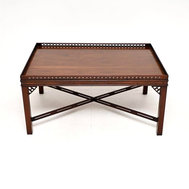 A smart and beautifully made antique Georgian style coffee table. This was made in England, it dates from around the...