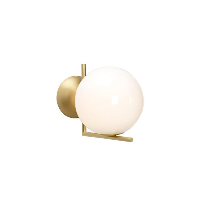 Opaque Glass Globe On Metal Wall Sconce. Clean with a dry cloth