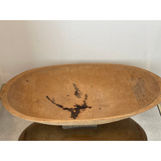 Large 20” handmade oval dough bowl with carved handles and a split in the middle , probably for water drain.