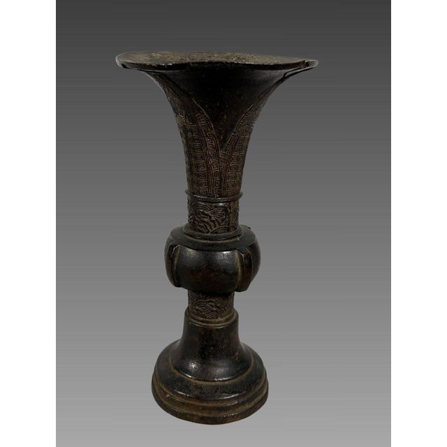 Chinese bronze Gu vase, Song dynasty (960-1279). The design incorporates archaic motifs from the Shang dynasty. The bronze...