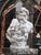 This impressive white marble bust depicts the mythical figure of Hercules, shown holding the head of the Nemean Lion. A...