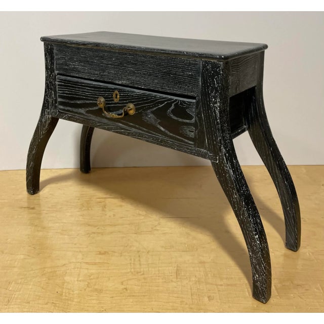 A limed oak English hall seat, having a plank top above the single drawer, and rising on outswept legs. I am madly in love...