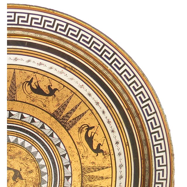 Elevate your bar cart or gallery wall with this striking Mid-Century Modern serving tray, featuring a bold Grecian-...