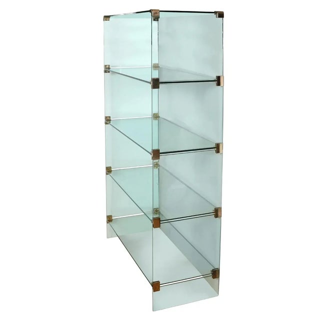 This minimalist four-tier étagère offers a clean, modern aesthetic with an emphasis on lightness and transparency. Each...