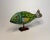 Needing a bright colored accessory to add to your coastal or nautical space? Then consider this fish figurine a 'keeper'...