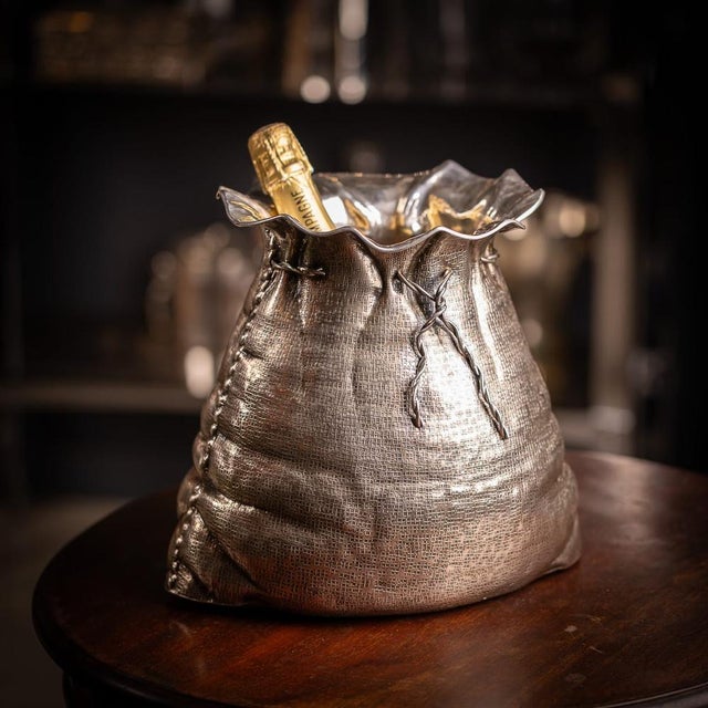 A vintage 20th century italian solid silver champagne cooler detailed as a drawstring sack, perfect for use as a vase....