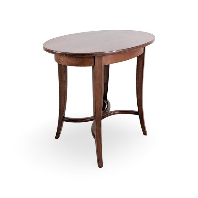 We are offering a beautiful kitchen dining table from the first half of the 20th century for sale. The table is...