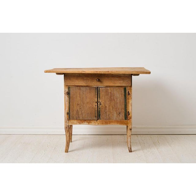 Unusual antique country sideboard from northern Sweden dating from around 1820. This type of furniture is often referred...