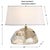Champagne crystal with abstract facets refracts light for additional warmth and glow. Complete with beige fabric-wrapped...