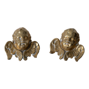A Pair of Brass Winged Cherub Head Mounts, 19th Century