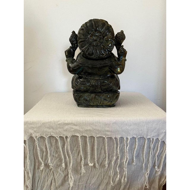 Rare statue of the Hindu deity Ganesha carved from a single block of labradorite (origin Madagascar). In Hinduism Ganesha...