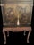 A chinoiserie cabinet on a carved cabriolet leg base with ball and claw feet. The base is very European looking. The...