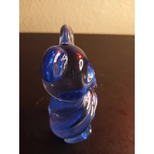 This is a Blue Art Glass 4" Mouse Figurine Procured at auction