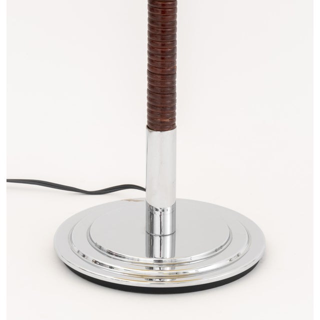 Metalarte Rattan Wrapped and Chrome-Plated Table Lamp, the fitting marked "Metalarte / Made in Spain", together with paper...