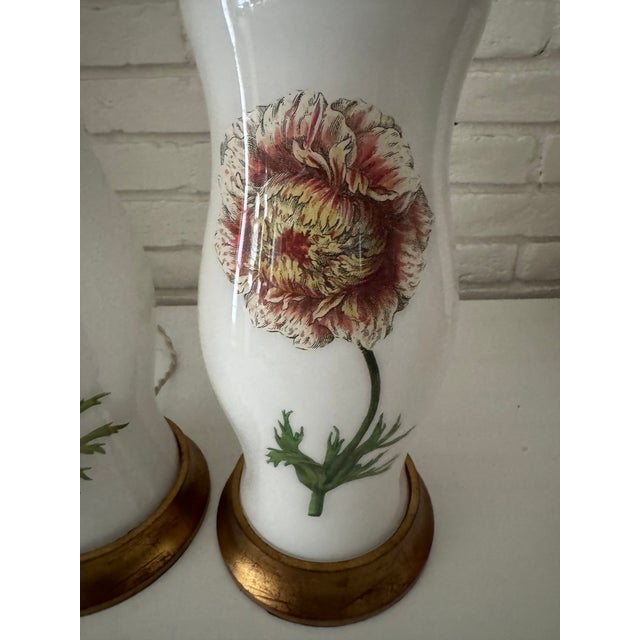 Exceptionally beautiful early hand colored English engravings complete this pair of charming decoupage lamps. Both have...