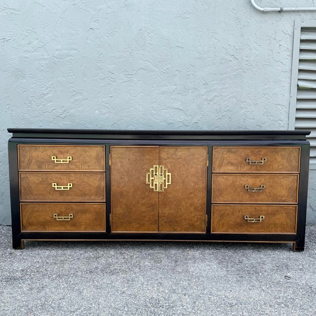 This vintage chinoiserie dresser by Century Furniture combines dramatic black framing with richly patterned burlwood...