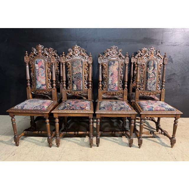 A lovely set of 8 French Carved Oak Dining Chairs, dating to the later part of the 19th Century. All are strong and sturdy...