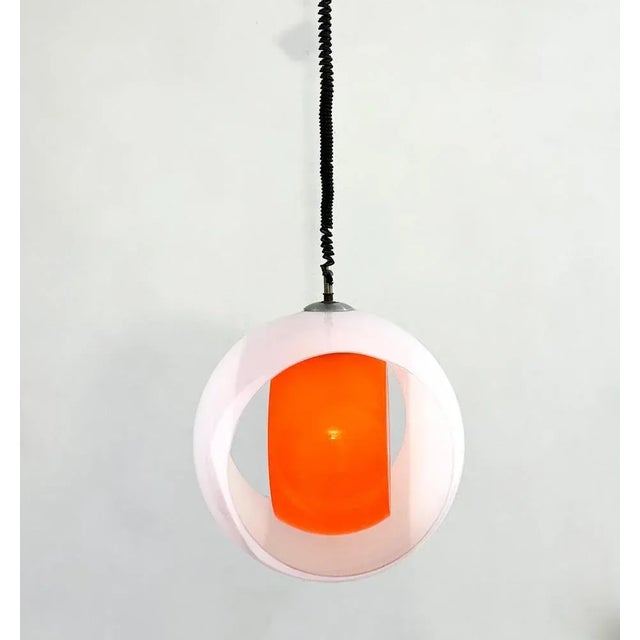 Mid-century Murano Glass White and Orange Suspension model "Eclisse" by Carlo Nason for Mazzega, Italy, 1960s. This piece...