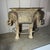 ~ Bring a statement piece into your home, patio, or garden with this unique elephant table base. Featuring two intricately...