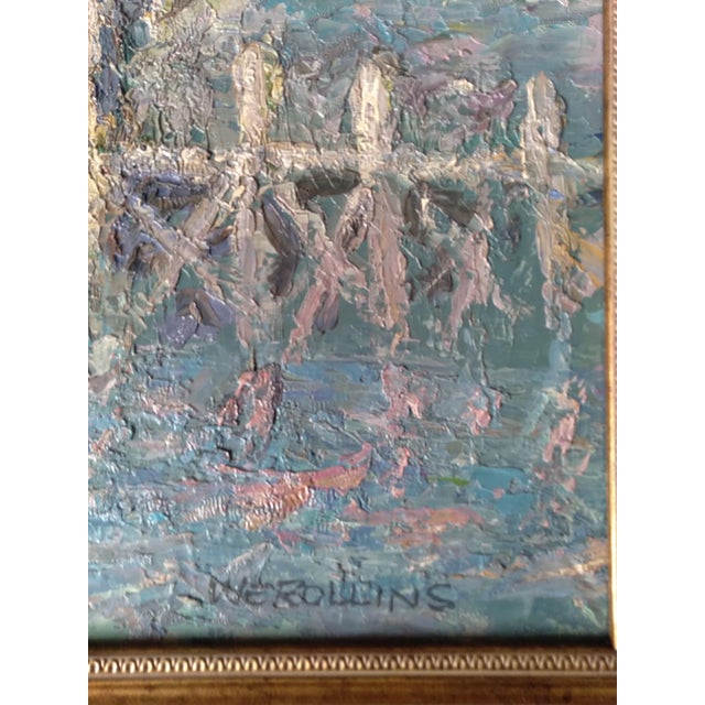 “Boats” by Warren Rollins (American, 1861–1962) is an original oil-on-canvas harbor scene featuring working boats, a dock,...