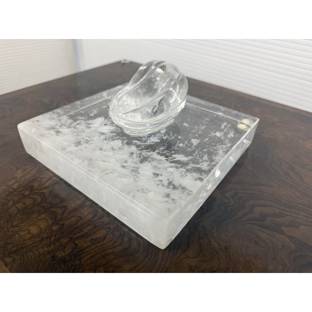 Design Plus Gallery presents a Rock Crystal Sculpture by Robert Kuo. The piece has a pepper that is resting on a square...