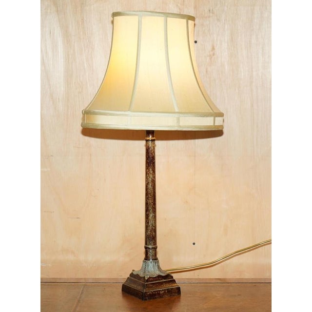 A very good looking well made and decorative pair of mid century modern Italian table lamps, they are in metal which I...