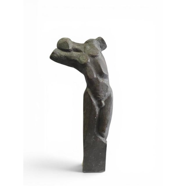Elegant abstract bronze sculpture depicting a human torso, created during the 1950s. Combining the timeless beauty of the...