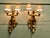 A Pair of Early 20th Century Golden Cherub Wall Lights 2 Baroque style figures a male and female rising from acanthus...