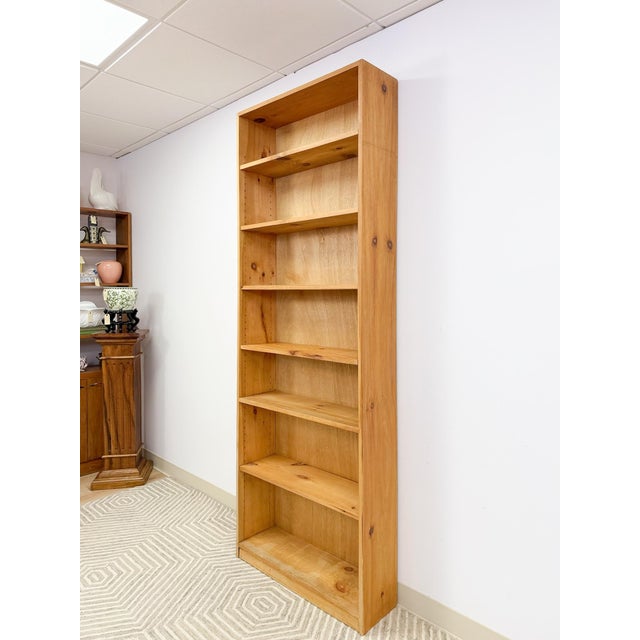 This stunning handmade pine shelving unit is a one-of-a-kind rustic treasure that brings warmth, character, and serious...