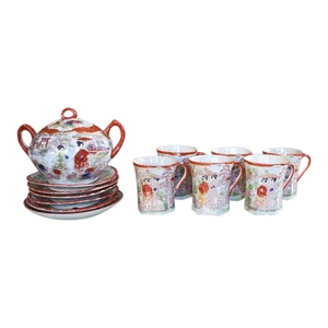 Japanese Geisha and Cherry Blossom Kutani Ware Porcelain Tea Cup and Saucer Set