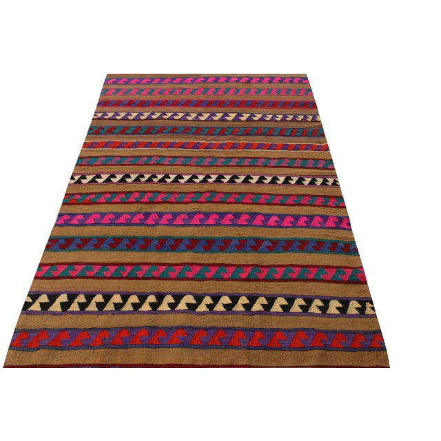 A joyful vintage rug showcasing nomadic sensibilities entering our Kilim & Flatweave collection. Originating from Turkey...