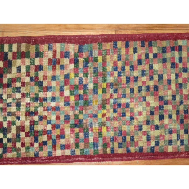 Rare size mid-20th century Turkish Deco long and narrow runner with a repetitive all-over checkerboard design. Measures:...