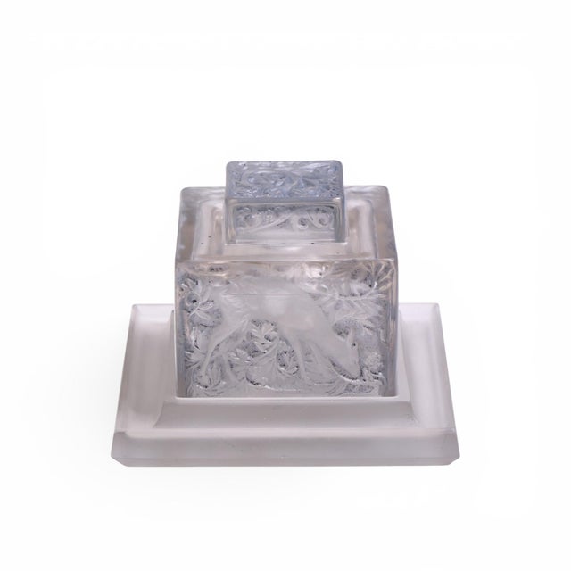 René Lalique 1912 Biches Inkwell on Undertray This inkwell on undertray measures: 6 wide x 6 deep x 4.25 inches high...