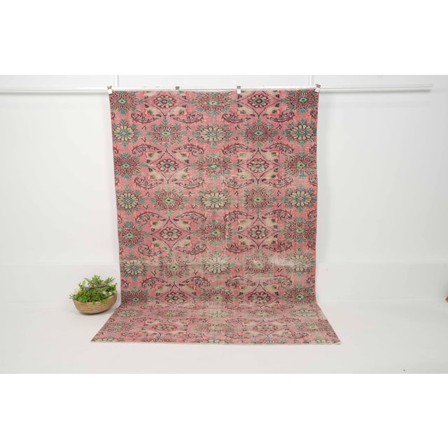 Vintage Hand-Knotted runner rug is a semi-antique vintage area rug. The '70s Eastern region of Anatolia's unique rug is...