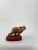 A powerful and expressive bronze sculpture capturing a bear mid-growl, frozen in a moment of raw intensity and natural...