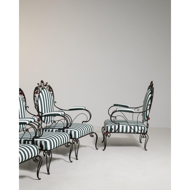 This black set of 1950s patio chairs brings sculptural iron work to an outdoor setting, made in Italy. Built for...