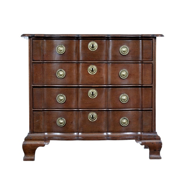 19th century shaped front oak chest of drawers circa 1880. dutch shaped oak chest of drawers commode with its serpentine...