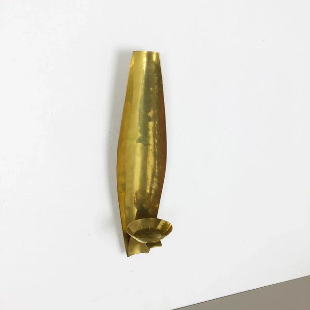 Article: brass wall candleholder producer: emil funk kg neuruppin, germany this original vintage wall candleholder was...