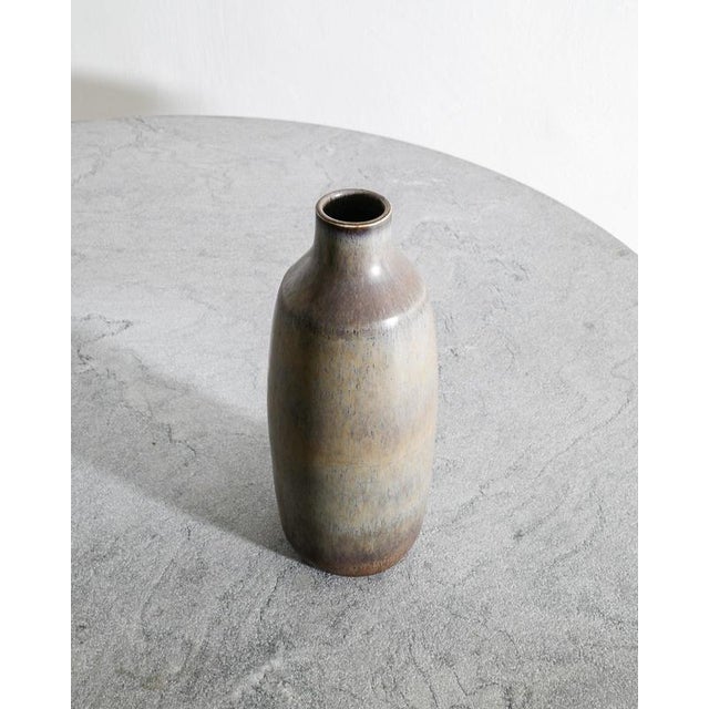 A unique and very decorative Swedish mid century modern ceramic stoneware vase in gray brown har fur glaze by Carl-Harry...